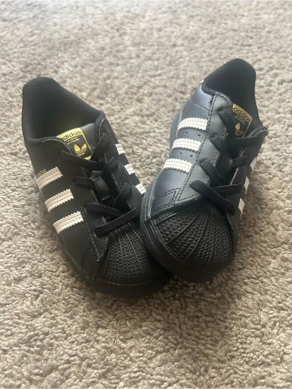 adidas Kids Black Sneakers with White Stripes and Gold Logo